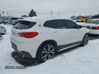 2018 BMW X2 xDrive28i z VIN WBXYJ5C34JEF76039, wystawiony jako IAAI lot #41563125 z przebiegiem 79 646 mil mil oraz . Historia ofert i sprzedaży dostępna na DreamBid. Obrazek 4.