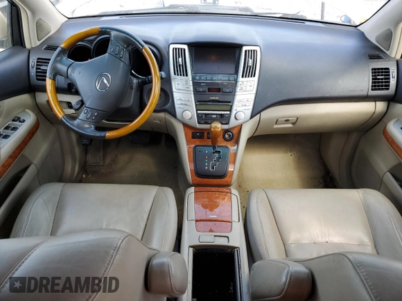 2008 Lexus RX 400h with VIN JTJGW31UX82007745, listed as a Copart auction lot 52857445 with 159,062 mi miles and Salvage Title. Bid and sale history available at DreamBid. Image 8.