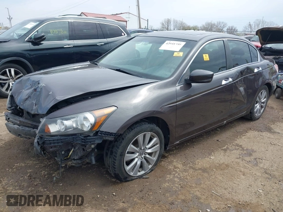 2012 Honda Accord EX z VIN 1HGCP3F70CA003446, wystawiony jako IAAI lot #42041395 z przebiegiem 195 895 mil mil oraz . Historia ofert i sprzedaży dostępna na DreamBid. Obrazek 17.