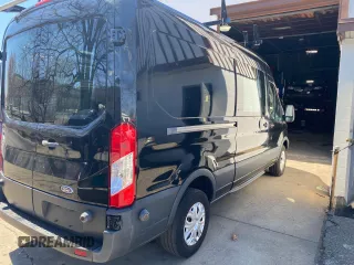 2015 Ford Transit Cargo with VIN 1FTNR2CMXFKA85769, listed as a Copart auction lot 53966365 with 147,051 mi miles and Clean Title. Bid and sale history available at DreamBid. Image 4.