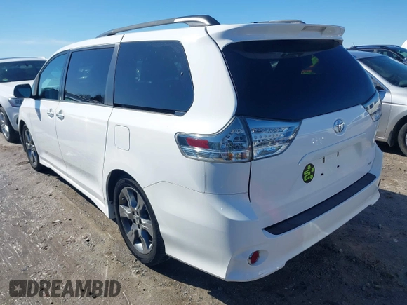 2015 Toyota Sienna SE with VIN 5TDXK3DC4FS658148, listed as a IAAI auction lot 41601341 with 110,329 mi miles. Bid and sale history available at carsss.com. Image 3.