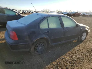 2000 Volkswagen Jetta GLS z VIN 3VWSA29M7YM057356, wystawiony jako Copart lot #76960844 z przebiegiem 299 410 mil mil oraz Szkoda całkowita • Salvage title. Historia ofert i sprzedaży dostępna na DreamBid. Obrazek 3.