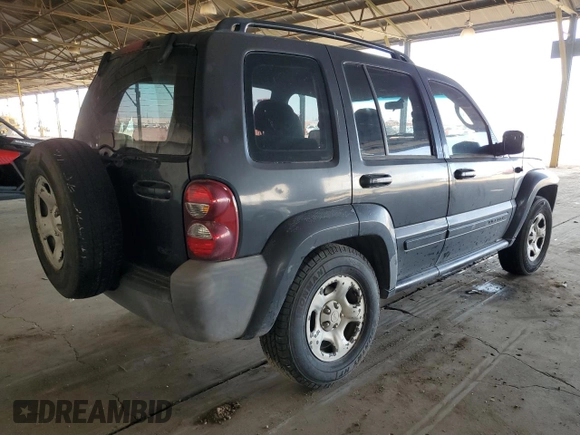2005 Jeep Liberty Sport with VIN 1J4GK48K45W664323, listed as a Copart auction lot 53851855 with 323,695 mi miles and Salvage Title. Bid and sale history available at DreamBid. Image 3.