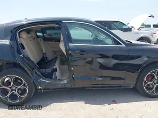 2020 Alfa Romeo Stelvio Ti z VIN ZASPAKBN8L7C95979, wystawiony jako IAAI lot #42018506 z przebiegiem 30 198 mil mil oraz . Historia ofert i sprzedaży dostępna na DreamBid. Obrazek 13.