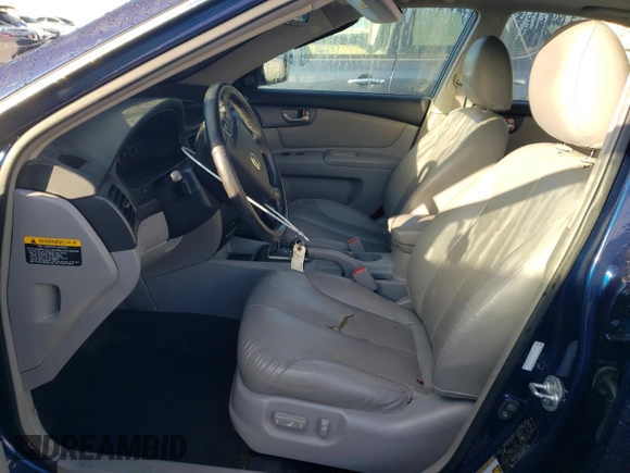 2007 Kia Optima EX with VIN KNAGE124875154603, listed as a Copart auction lot 79768494 with 76,588 mi miles and Salvage Title. Bid and sale history available at carsss.com. Image 7.