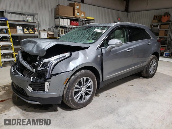 2023 Cadillac XT5 AWD Premium Luxury with VIN 1GYKNDRS5PZ221261, listed as a Copart auction lot 52779565 with 7,098 mi miles and Salvage Title. Bid and sale history available at DreamBid. Image 1.