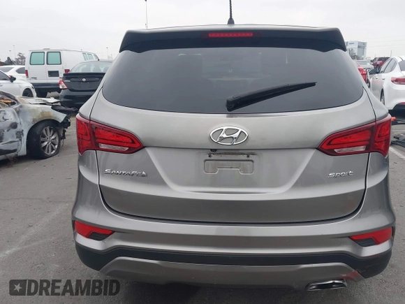 2018 Hyundai Santa Fe 2.4L with VIN 5XYZT3LB7JG569517, listed as a IAAI auction lot 42141100 with 57,854 mi miles and . Bid and sale history available at DreamBid. Image 17.