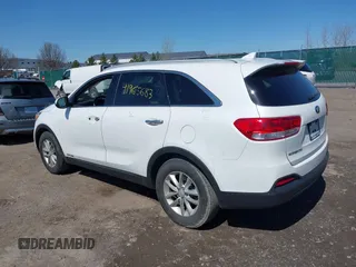 2016 Kia Sorento LX with VIN 5XYPGDA55GG081559, listed as a IAAI auction lot 41965683 with 94,177 mi miles. Bid and sale history available at carsss.com. Image 3.