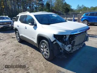 2021 GMC Acadia SLT with VIN 1GKKNMLS2MZ235553, listed as a IAAI auction lot 41077083 with 32,727 mi miles. Bid and sale history available at carsss.com. Image 1.