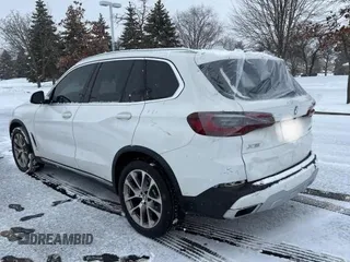 2021 BMW X5 xDrive40i with VIN 5UXCR6C03M9G52955, listed as a Copart auction lot 41009913 with 7,476 mi miles. Bid and sale history available at carsss.com. Image 3.