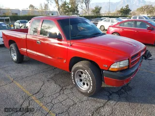 1998 Dodge Dakota SLT with VIN 1B7GL22Y9WS500143, listed as a IAAI auction lot 41353029 with 147,552 mi miles. Bid and sale history available at carsss.com. Image 1.