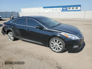 2014 Hyundai Azera Limited z VIN KMHFH4JG3EA424176, wystawiony jako Copart lot #55837825 z przebiegiem 133 781 mil mil oraz Szkoda całkowita • Salvage title. Historia ofert i sprzedaży dostępna na DreamBid. Obrazek 4.