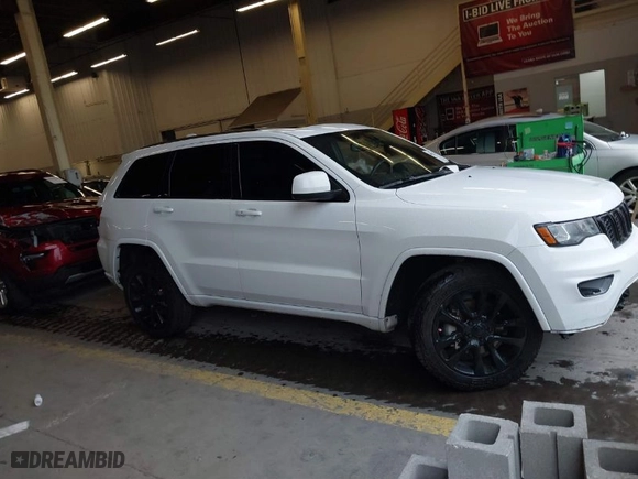 2019 Jeep Grand Cherokee Laredo E with VIN 1C4RJFAG1KC818289, listed as a IAAI auction lot 41602541 with 59,356 mi miles. Bid and sale history available at carsss.com. Image 14.