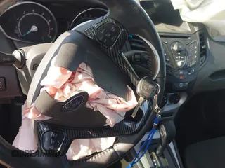 2014 Ford Fiesta SE with VIN 3FADP4BJ9EM174329, listed as a IAAI auction lot 42003743 with 86,744 mi miles. Bid and sale history available at carsss.com. Image 11.