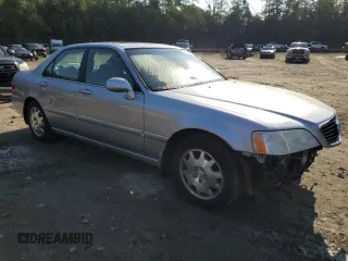 2004 Acura RL w/Navigation System with VIN JH4KA96664C005194, listed as a Copart auction lot 72174224 with 71,304 mi miles and Salvage Title. Bid and sale history available at carsss.com. Image 4.
