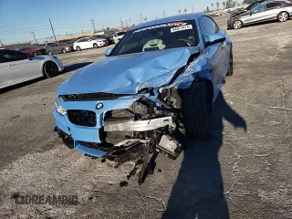 2017 BMW M4 with VIN WBS3U9C57HP970954, listed as a Copart auction lot 84011474 with 56,882 mi miles and Salvage Title. Bid and sale history available at carsss.com. Image 10.