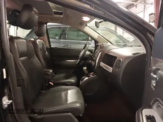 2015 Jeep Compass Latitude with VIN 1C4NJDEBXFD304409, listed as a IAAI auction lot 41629121 with 123,486 mi miles. Bid and sale history available at carsss.com. Image 5.