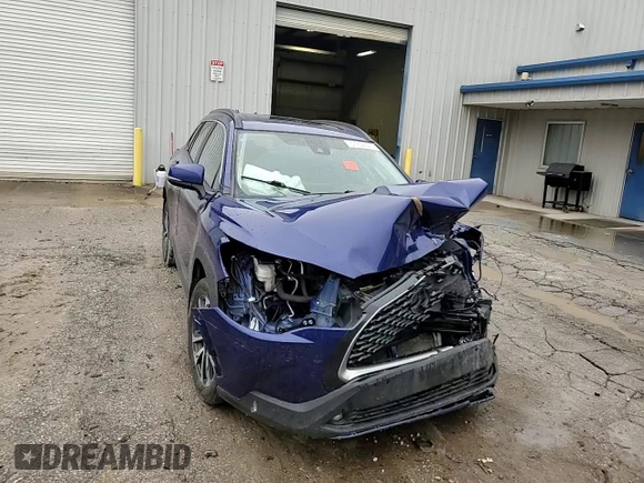 2022 Toyota Corolla Cross XLE with VIN 7MUDAABGXNV042443, listed as a Copart auction lot 57808565 with 102,887 mi miles and Salvage title. Bid and sale history available at DreamBid. Image 14.