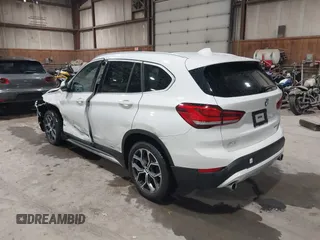 2021 BMW X1 xDrive28i with VIN WBXJG9C04M5T82884, listed as a IAAI auction lot 42242890 with 24,647 mi miles and . Bid and sale history available at DreamBid. Image 3.