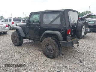 2015 Jeep Wrangler Willys Wheeler with VIN 1C4AJWAG8FL759566, listed as a IAAI auction lot 42716154 with 95,744 mi miles and . Bid and sale history available at DreamBid. Image 3.