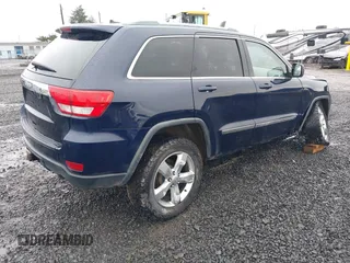 2012 Jeep Grand Cherokee Laredo with VIN 1C4RJFAG9CC220145, listed as a IAAI auction lot 41798457 with 130,603 mi miles. Bid and sale history available at carsss.com. Image 4.