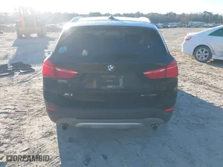 2019 BMW X1 sDrive28i with VIN WBXHU7C52K5L11560, listed as a IAAI auction lot 41354422 with 115,401 mi miles. Bid and sale history available at carsss.com. Image 16.