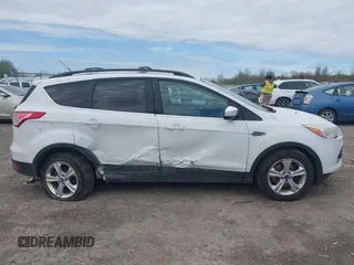 2013 Ford Escape SE with VIN 1FMCU9GX7DUA96986, listed as a IAAI auction lot 42160197 with 193,189 mi miles and . Bid and sale history available at DreamBid. Image 13.