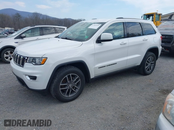 2018 Jeep Grand Cherokee Laredo z VIN 1C4RJFAG1JC479838, wystawiony jako IAAI lot #41903955 z przebiegiem 73 076 mil mil oraz . Historia ofert i sprzedaży dostępna na DreamBid. Obrazek 21.