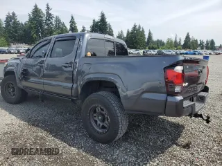 2021 Toyota Tacoma SR with VIN 3TMCZ5AN7MM406483, listed as a Copart auction lot 62501415 with 50,754 mi miles and Salvage title. Bid and sale history available at DreamBid. Image 2.