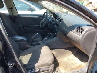 2015 Volkswagen Jetta Sedan 1.8T SE with VIN 3VWD17AJ6FM285921, listed as a IAAI auction lot 42005164 with 173,028 mi miles. Bid and sale history available at carsss.com. Image 5.