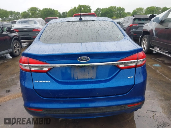2017 Ford Fusion SE z VIN 3FA6P0H79HR170835, wystawiony jako IAAI lot #41911416 z przebiegiem 67 219 mil mil oraz . Historia ofert i sprzedaży dostępna na DreamBid. Obrazek 17.