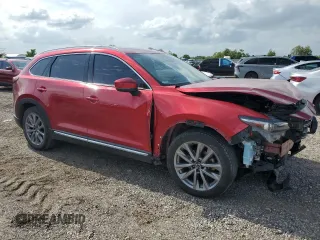 2021 Mazda CX-9 Grand Touring with VIN JM3TCBDY4M0539332, listed as a Copart auction lot 54756125 with 65,614 mi miles and Salvage title. Bid and sale history available at DreamBid. Image 4.