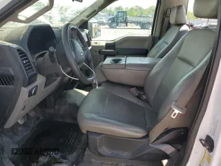 2018 Ford F-150 XL with VIN 1FTMF1CB2JKC31099, listed as a Copart auction lot 52078995 with 219,569 mi miles and Salvage title. Bid and sale history available at DreamBid. Image 7.