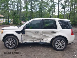2009 Land Rover LR2 HSE z VIN SALFT24N09H146327, wystawiony jako IAAI lot #42470153 z przebiegiem 152 507 mil mil oraz . Historia ofert i sprzedaży dostępna na DreamBid. Obrazek 6.