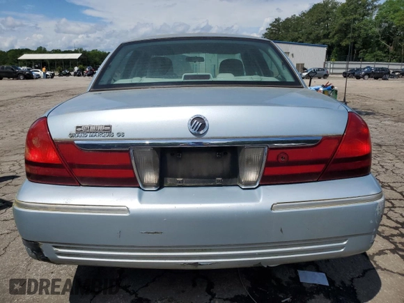 2005 Mercury Grand Marquis GS z VIN 2MEFM74W45X611002, wystawiony jako Copart lot #56645615 z przebiegiem 141 059 mil mil oraz Tytuł czysty. Historia ofert i sprzedaży dostępna na DreamBid. Obrazek 6.