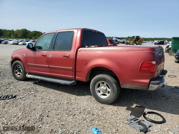 2001 Ford F-150 SuperCrew XLT with VIN 1FTRW07L91KE48149, listed as a Copart auction lot 70670704 with 0 mi miles and Salvage Title. Bid and sale history available at carsss.com. Image 2.