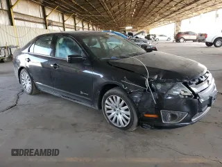 2012 Ford Fusion Hybrid с VIN 3FADP0L34CR416775, выставлен на аукционе Copart как лот 55108645 с пробегом 102 574 миль миль и Списание • Salvage title. История ставок и продаж доступна на DreamBid. Изображение 4.