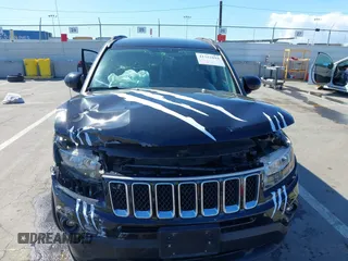 2016 Jeep Compass Latitude with VIN 1C4NJCEB2GD628384, listed as a IAAI auction lot 41752694 with 122,589 mi miles. Bid and sale history available at carsss.com. Image 12.