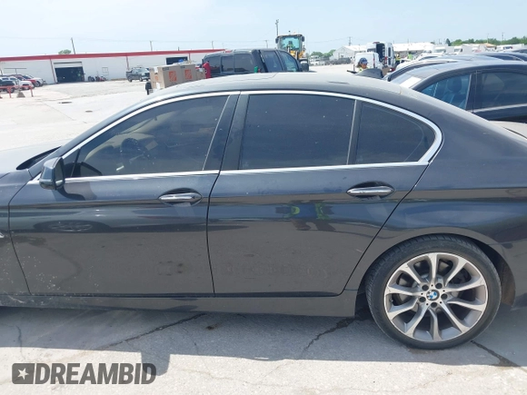 2014 BMW 5 Series 535i with VIN WBA5B1C51ED475795, listed as a IAAI auction lot 42028184 with 119,692 mi miles. Bid and sale history available at carsss.com. Image 14.