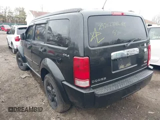 2009 Dodge Nitro SLT with VIN 1D8GU58K19W525618, listed as a IAAI auction lot 41726192 with 999,999 mi miles. Bid and sale history available at carsss.com. Image 3.