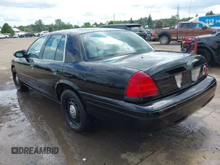 2005 Ford Police Interceptor z VIN 2FAHP71WX5X154384, wystawiony jako IAAI lot #40735796 z przebiegiem 84 143 mil mil oraz . Historia ofert i sprzedaży dostępna na DreamBid. Obrazek 3.
