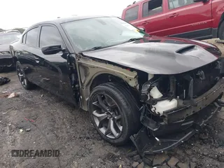 2018 Dodge Charger SXT Plus with VIN 2C3CDXHG0JH289216, listed as a IAAI auction lot 42085449 with 90,902 mi miles and . Bid and sale history available at DreamBid. Image 1.