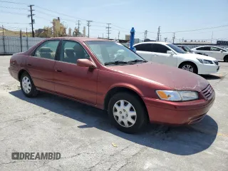1999 Toyota Camry LE z VIN JT2BG22K6X0274398, wystawiony jako Copart lot #57263795 z przebiegiem 202 944 mil mil oraz Szkoda całkowita • Salvage title. Historia ofert i sprzedaży dostępna na DreamBid. Obrazek 4.