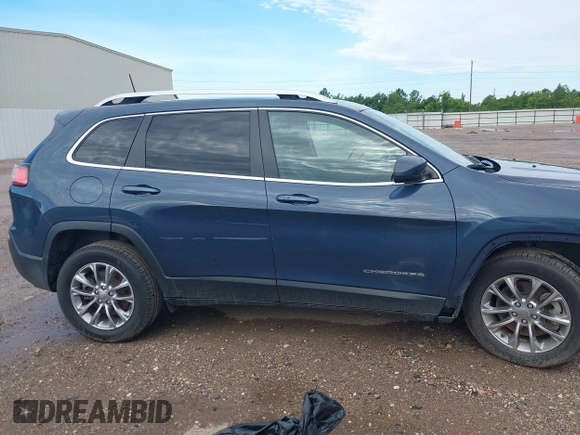 2021 Jeep Cherokee Latitude Lux with VIN 1C4PJLMX2MD107165, listed as a IAAI auction lot 42456893 with 62,625 mi miles and . Bid and sale history available at DreamBid. Image 14.