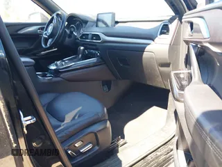 2018 Mazda CX-9 Grand Touring z VIN JM3TCBDY2J0237050, wystawiony jako IAAI lot #42457060 z przebiegiem 130 625 mil mil oraz . Historia ofert i sprzedaży dostępna na DreamBid. Obrazek 5.
