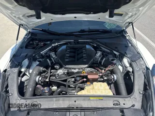 2020 Nissan GT-R Premium z VIN JN1AR5EF7LM100066, wystawiony jako Copart lot #58606645 z przebiegiem 35 824 mil mil oraz Szkody całkowita. Historia ofert i sprzedaży dostępna na DreamBid. Obrazek 7.