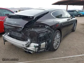 2011 Porsche Panamera Turbo with VIN WP0AC2A70BL090139, listed as a IAAI auction lot 41721430 with 65,160 mi miles. Bid and sale history available at carsss.com. Image 4.