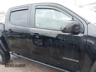 2018 Chevrolet Colorado 4WD ZR2 with VIN 1GCGTEEN9J1173647, listed as a IAAI auction lot 42016015 with 102,041 mi miles. Bid and sale history available at carsss.com. Image 14.