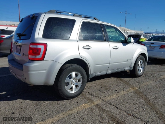 2009 Ford Escape Hybrid with VIN 1FMCU49389KA14781, listed as a IAAI auction lot 41409142 with 155,728 mi miles. Bid and sale history available at carsss.com. Image 4.