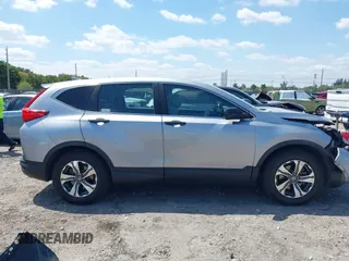2019 Honda CR-V LX with VIN 2HKRW5H31KH411771, listed as a IAAI auction lot 42060193 with 175,036 mi miles and . Bid and sale history available at DreamBid. Image 13.